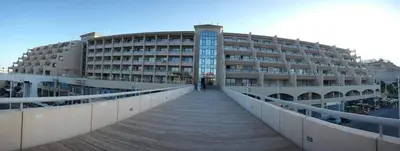 a building with a boardwalk leading to a building at New studio in the view in Hurghada
