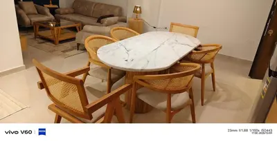 a marble table and chairs in a living room at Moon Hills Palace in Hurghada