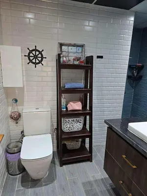 a bathroom with a toilet and a sink at Hurghada ,Mo&Kate Florenza Khamsin in Hurghada