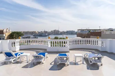 a group of chairs sitting on top of a building at Home of ISIS in Luxor