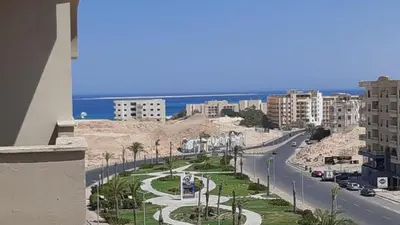 a view of a street in a city with buildings at Sea View 2 Bedroom Apartment in El-Hadaba in Hurghada