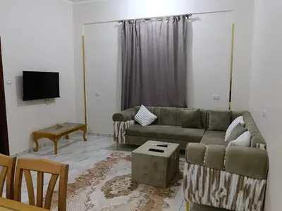 a living room with a couch and a table at القصير البحر الاحمر in Quseir