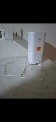 a white computer monitor sitting on top of a table at Al helal in Hurghada