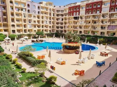 a large apartment complex with a large swimming pool at Florenze J113 Hurghada in Hurghada