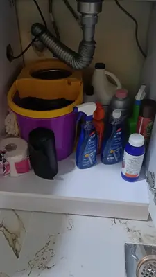 a shelf with a pot and other items on it at Sea view Hotel Apartment in center in Hurghada