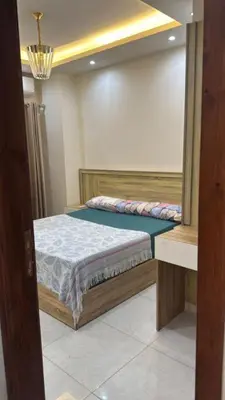 a bedroom with a bed in a room at Moon Apartment Hurghada in Hurghada