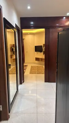 a hallway with a room with a living room at Moon Apartment Hurghada in Hurghada