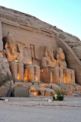 a large stone wall with statues on it at Modern Riverside Apartment 3BR in Aswan Downtown in Aswan