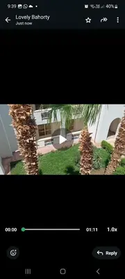 a screenshot of a balcony with a palm tree at Mirage aquapark resort 776c in Hurghada