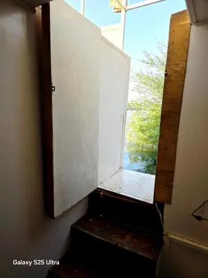 an open door to a window in a room at The Grand in Aswan