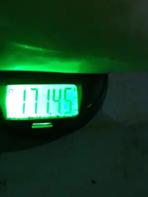 a green clock on the side of a car at ادفو قنا القاهره