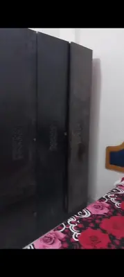 a pair of lockers in a room with a bed at Casablanca resort hi in Hurghada