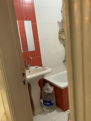 a bathroom with a sink and a toilet and a tub at Luxor is adorable! in Luxor