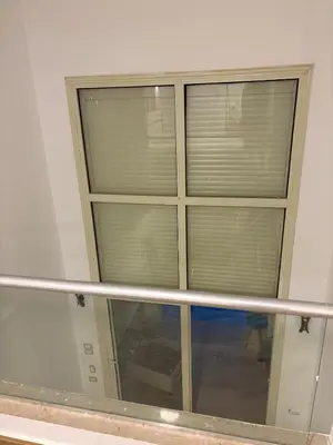 a room with a large window with blinds at Duplex in Edelma Oldtown Sahl Hasheesh in Hurghada