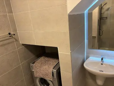 a small bathroom with a sink and a toilet at Duplex in Edelma Oldtown Sahl Hasheesh in Hurghada