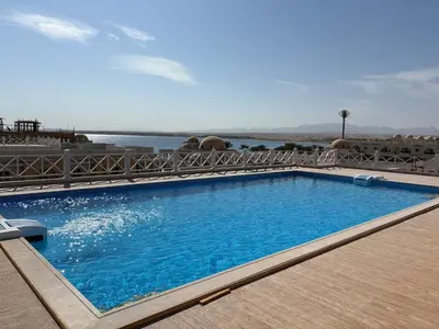 a swimming pool on top of a resort at Duplex in Edelma Oldtown Sahl Hasheesh in Hurghada
