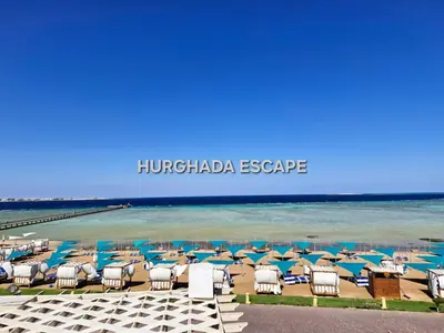 a group of chairs and umbrellas on a beach at Gravity Sahl Hasheesh Not Egyptians in Hurghada