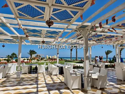 a marquee at the beach with white tables and chairs at Gravity Sahl Hasheesh Not Egyptians in Hurghada