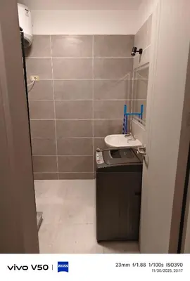 a small bathroom with a sink and a mirror at Sahl hashish in Hurghada