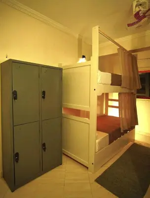 a bunk bed in a room with a bunk bedutenewayewayangering at Jme Bunks Hostel in Aswān