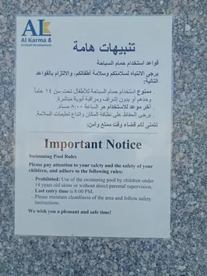 a sign that says important notice on a wall at Hurghada luxury apartment sea view in Hurghada