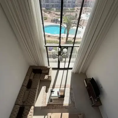 Bright Kamaran 2BR | Lofty Ceilings & Pool Access