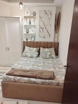 a bedroom with a large bed in a room at Seaview Classy 2Bedroom Suite with beach access in Hurghada