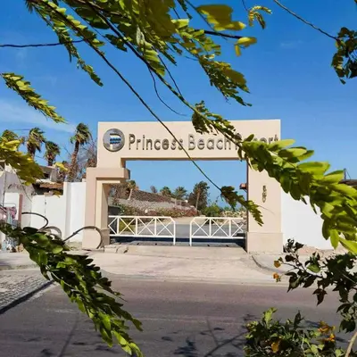 a sign for the entrance to a massage beech beach at Sunrise Luxury Apartment in Hurghada