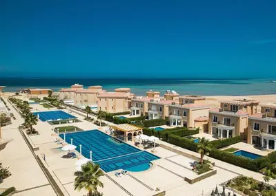 an aerial view of a resort with a pool and the beach at Selena Bay Resort - VIP apartment with Private Beach Area in Hurghada