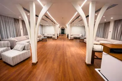 a waiting room with white couches and chairs at Dahabiya Hathor Nile Cruise - Saturday from Luxor 4 Nights , Wednesday from Aswan 3 Nights & Available for Charter in Luxor