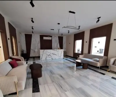 a large living room with couches and a table in it at La bella resort touristic walkway hurghada in Hurghada