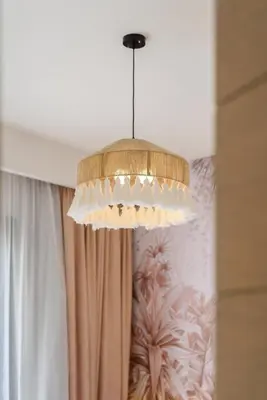 a chandelier hanging from a ceiling in a room at The Best House in Makadi in Hurghada