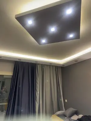 a room with a coffered ceiling with a window and a curtain at Veranda resort in Hurghada