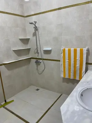 a bathroom with a shower and a sink at Durrat al-Nahr in Luxor