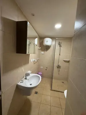 a bathroom with a sink and a shower at Casa Bonita 2307 in Hurghada