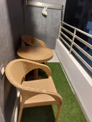 two wicker chairs sitting on top of a balcony at سولتير in Hurghada
