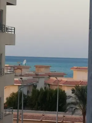 a view of the ocean from a building at سولتير in Hurghada