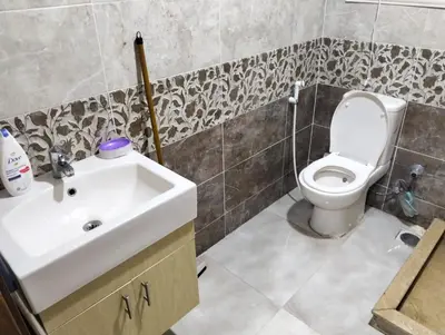 a bathroom with a sink and a toilet at البرنسيسة in Hurghada
