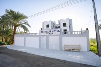 a building with a sign that readsantis hotel of winds at Astralis Hotel - Hot Air Balloon View in Al Aqālitah