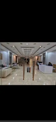 a large lobby with couches and tables in a building at Hurghada Pool & See View Studio in Hurghada