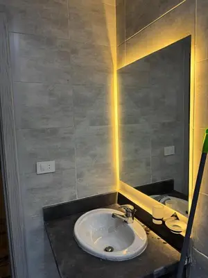 a bathroom with a sink and a mirror at Panorama view in Hurghada