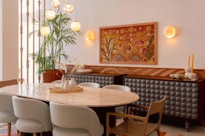 a dining room with a table and chairs at The Reef House Luxury Waterfront Villa in Hurghada