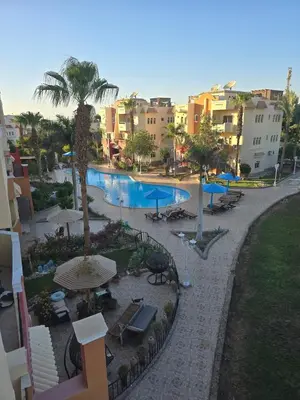 a view of a swimming pool in a resort at green garden resort in Hurghada