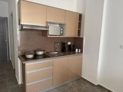 a kitchen with a sink and a counter at Aqua infinity resort in Hurghada