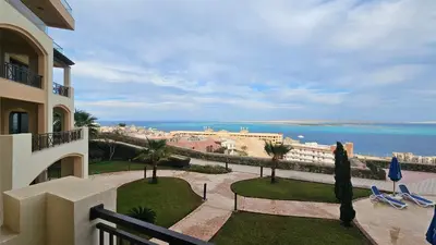 a balcony of a building with a view of the ocean at Exklusive Ferienwohnung mit traumhafter Meeressicht in Hurghada