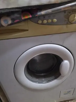 a close up of a washing machine with its door open at شقة صغيرة قريبة من شاطئ البحر في سفاجا in Safaga