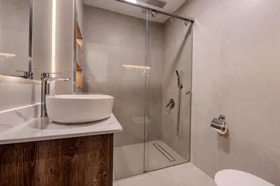 a bathroom with a sink and a shower at Luxury Sea View Apartment Near Hurghada Airport in Hurghada