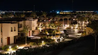a view of a parking lot at night with lights at New Modern Boutique 2BR - Sunset & Sea views in Hurghada