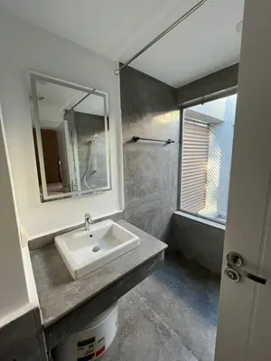 a bathroom with a sink and a mirror at Bali elgouna private heated pool in Hurghada