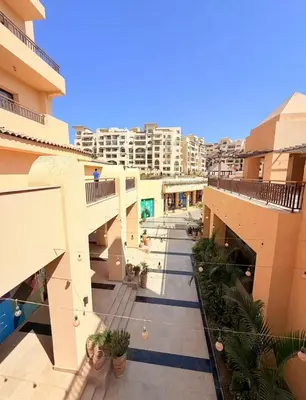 a view of the courtyard of a building at Luxury apartment pool view in Hurghada